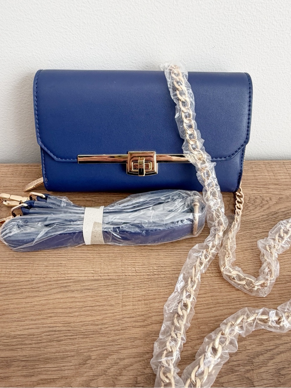 Elegant Navy Crossbody Bag with Gold Chain Strap